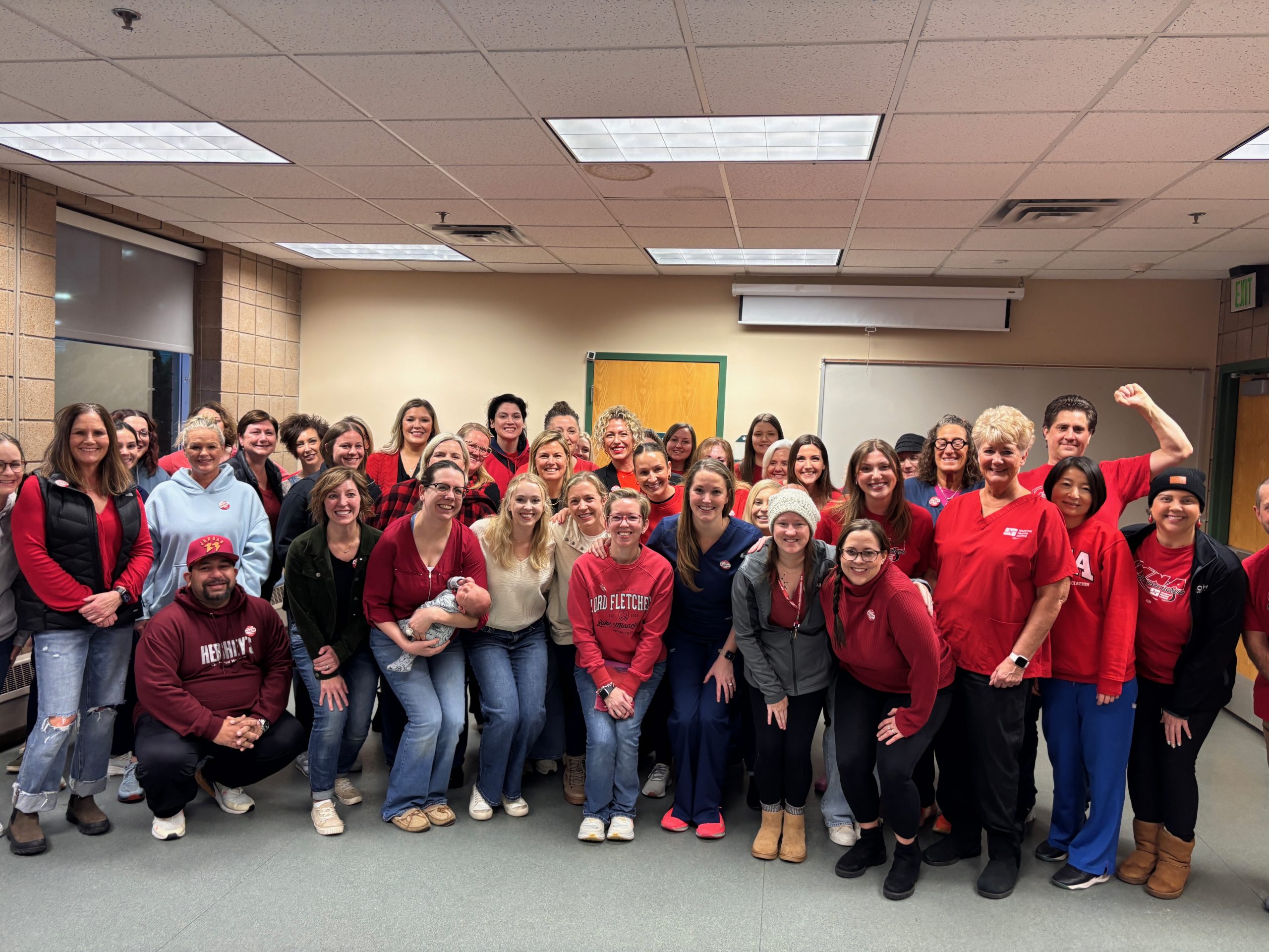 MNA nurses standing together in unity.