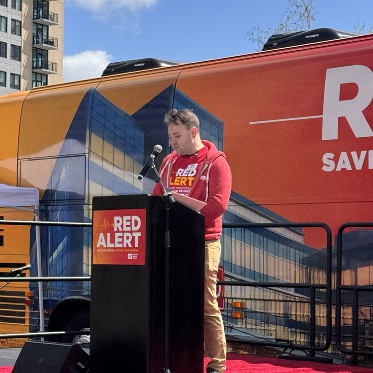 Jeremy Olson-Ehlert, RN speaks at the Red Alert Tour